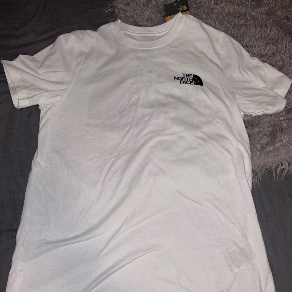 White northface shirt